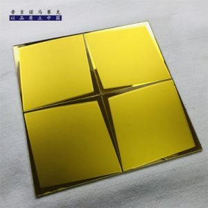 An artistic mosaic tile with a combination of glass and mirror materials, adding an elegant touch to any space.