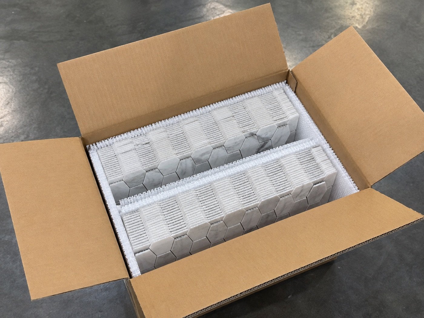 Mesh mounted mosaic sheets packed securely in export carton